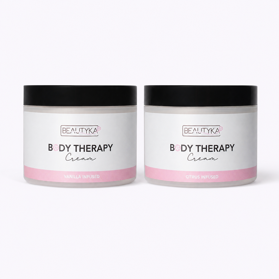 Beautyka Body Therapy Nourishing Cream jars in citrus and vanilla on a neutral off-white background.