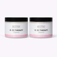 Beautyka Body Therapy Nourishing Cream jars in citrus and vanilla on a neutral off-white background.