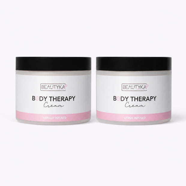 Beautyka Body Therapy Nourishing Cream jars in citrus and vanilla on a neutral off-white background.