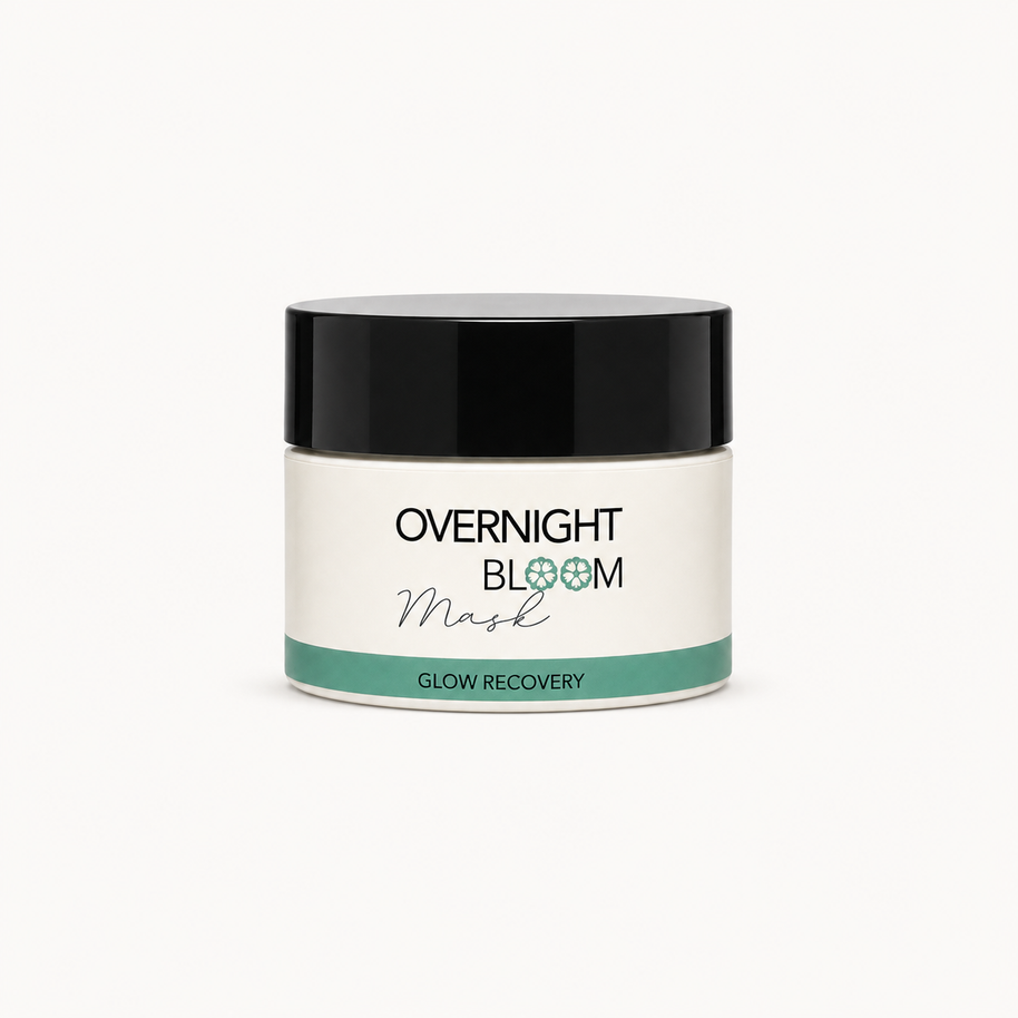 A jar of Overnight Bloom Mask Glow Recovery on a clean white background. The product features a white jar with a black lid and a teal accent band on the label.