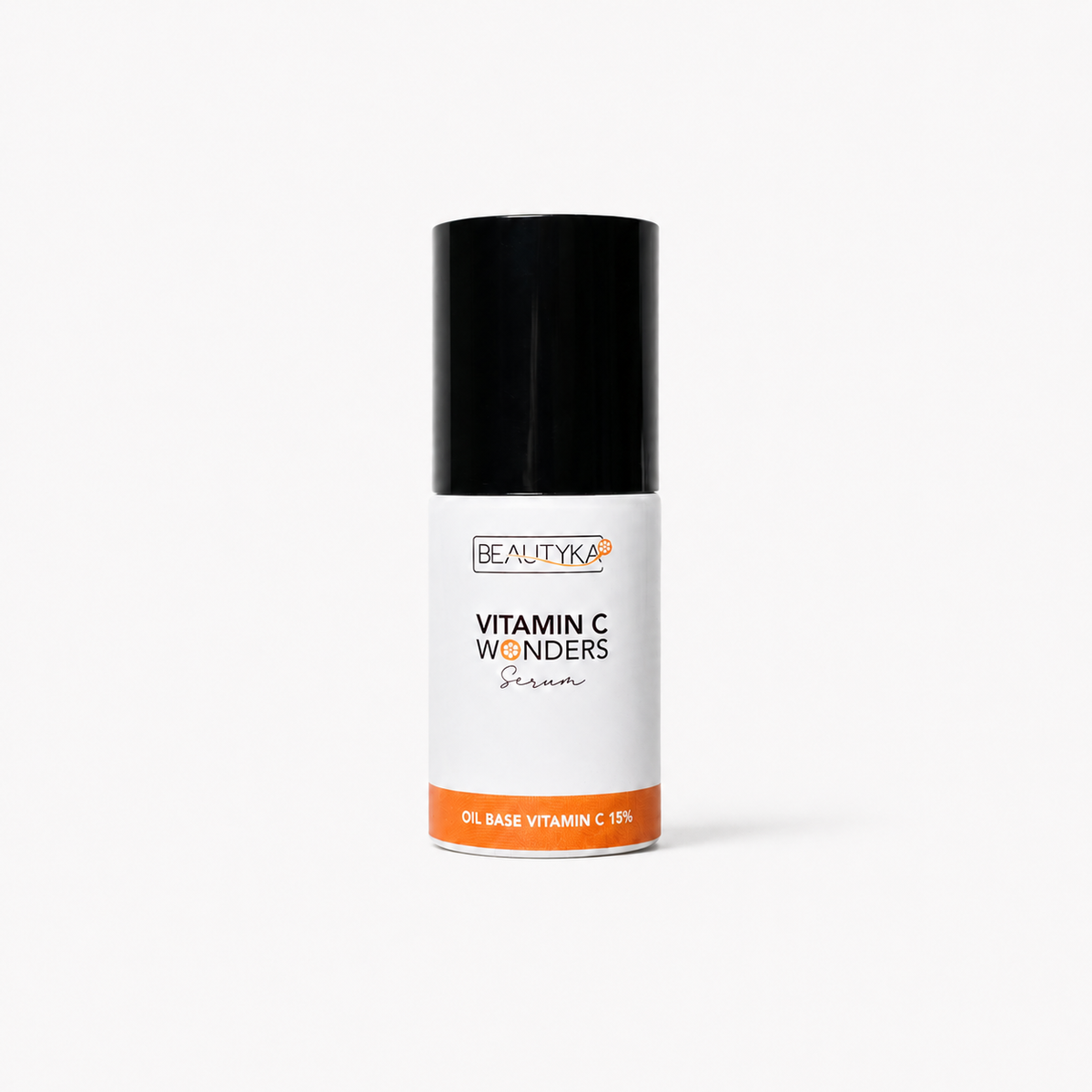 A bottle of Beautyka Vitamin C Wonders Oil Serum with an orange band and black cap on a clean white background.