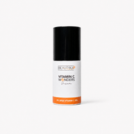 A bottle of Beautyka Vitamin C Wonders Oil Serum with an orange band and black cap on a clean white background.