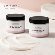 Beautyka Body Therapy Nourishing Cream jars styled with a smear of the cream on a light surface.