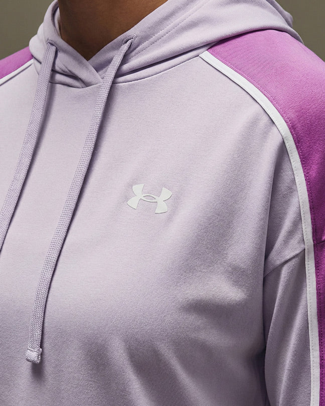 Lavender hooded sweatshirt with white logo and purple shoulder stripes, close-up view