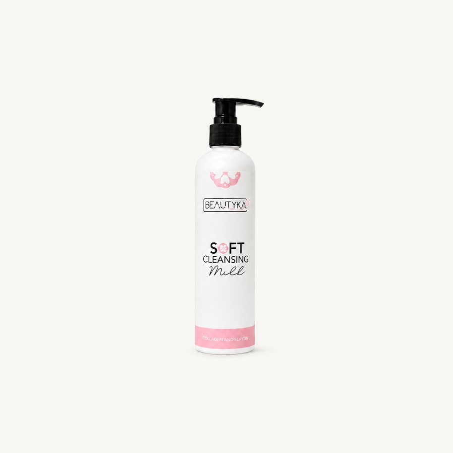 A white bottle of Beautyka Soft Cleansing Milk with a black pump and pink accents on an off-white background.
