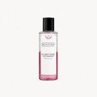 A bottle of BEAUTYKA Double Phase Eye Makeup remover, featuring a clear bottle with pink liquid, a white label, and a black cap, set against a plain off-white background.