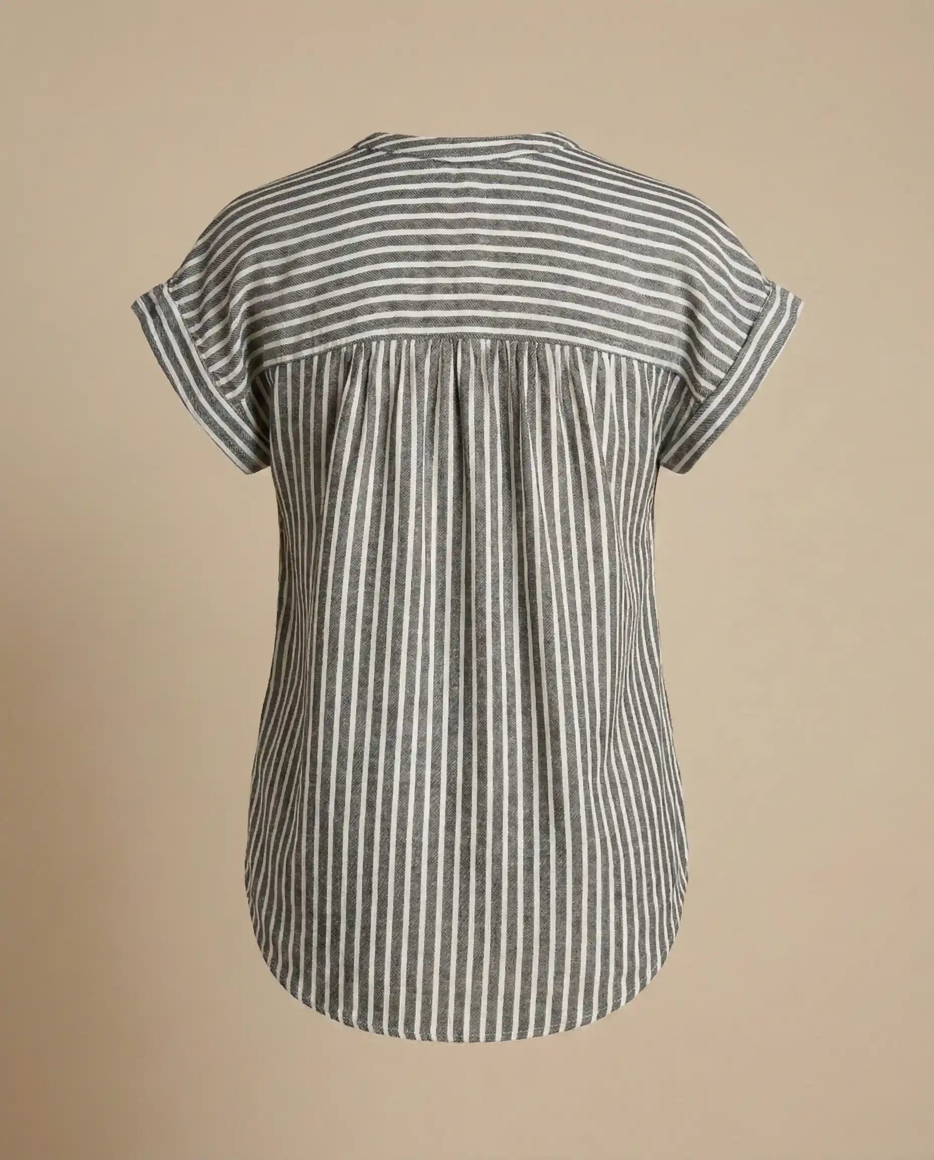 Back view of a short sleeve gray and white striped blouse with rolled cuffs