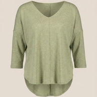 Light green V-neck long sleeve knit top with high-low hem and seam detail