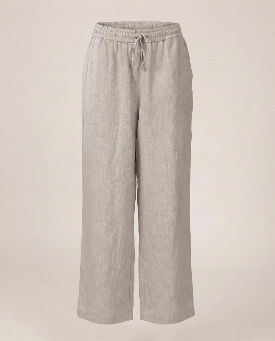 Light grey linen wide-leg pants with elastic waistband and drawstring, casual style.