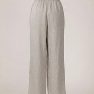 Light grey wide-leg linen pants with elastic waistband on a mannequin