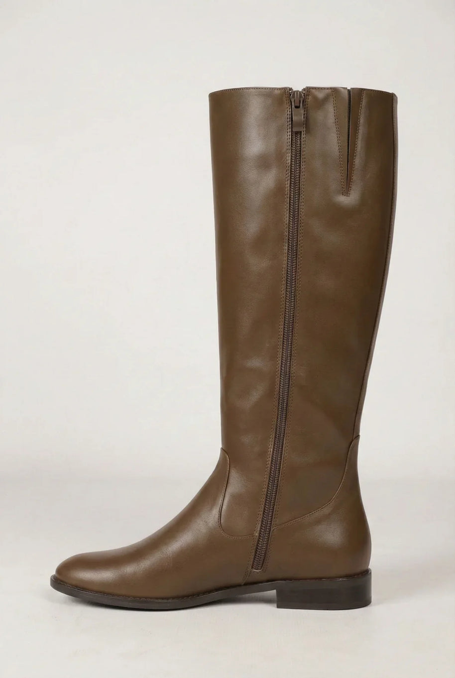 Brown knee-high leather boot with side zipper on white background