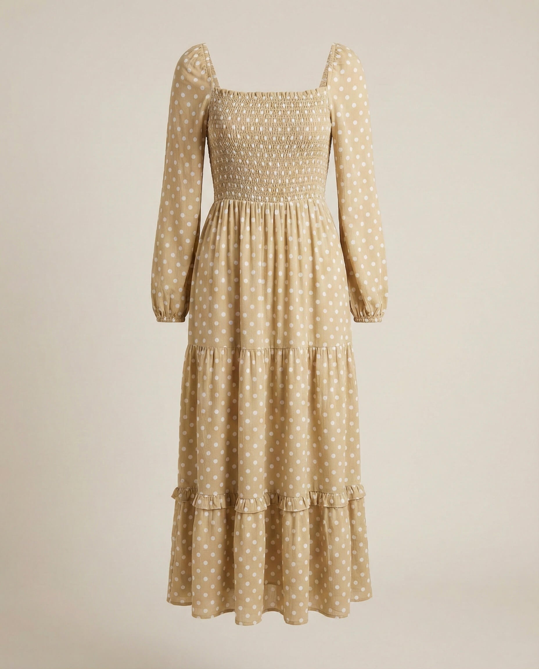 Beige long-sleeve polka dot midi dress with smocked bodice and ruffle hem