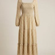 Beige long-sleeve polka dot midi dress with smocked bodice and ruffle hem