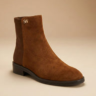 Brown suede ankle boot with low heel and SW gold logo on the side