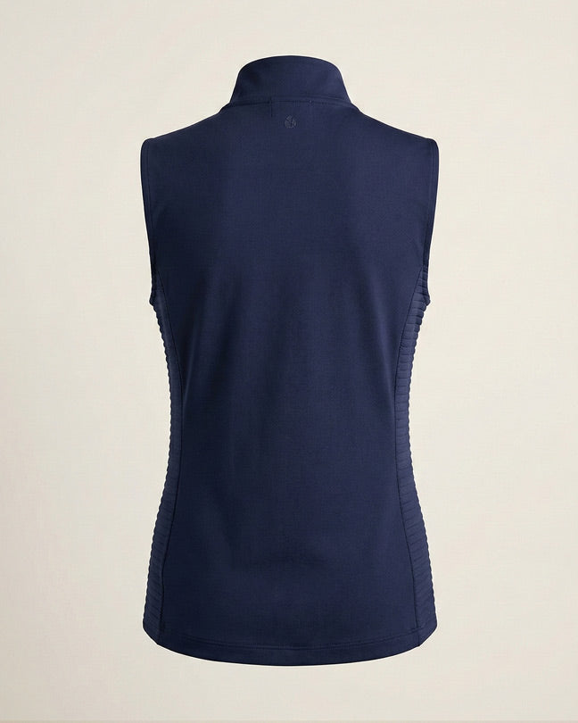 Back view of a sleeveless navy blue vest with stand-up collar on neutral background
