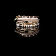 The Dark Ivory & Mocha Beaded Bracelet Stack Gold Compass Charm