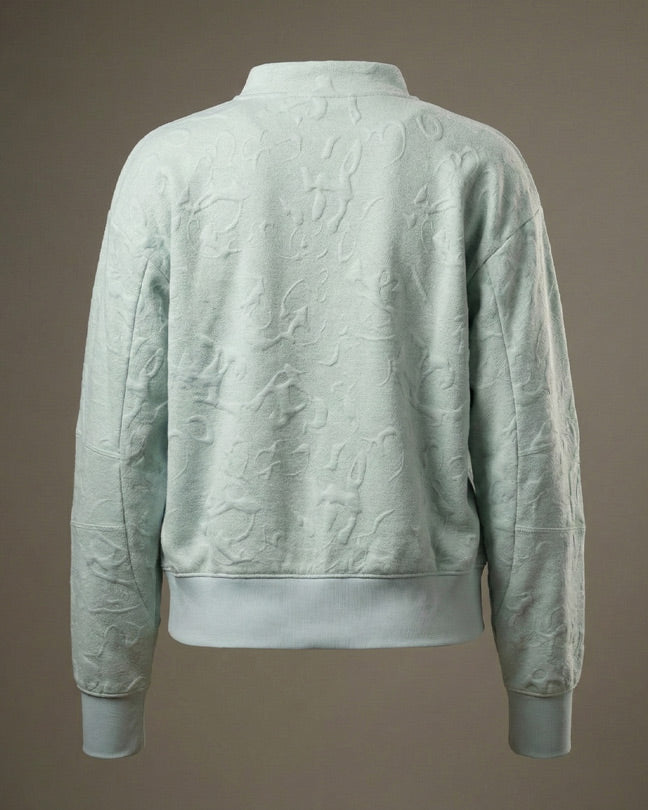 Light green embossed pattern sweatshirt, back view, ribbed cuffs and hem