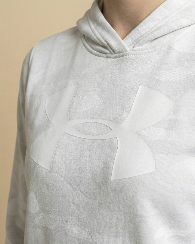 Light grey hooded sweatshirt with large embossed logo on chest, close-up view