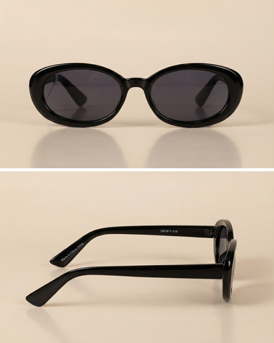 Black oval sunglasses with dark lenses, glossy finish, shown front and side view on beige background