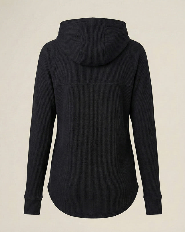 Black ribbed knit hoodie with long sleeves, curved hem, shown from the back on light background
