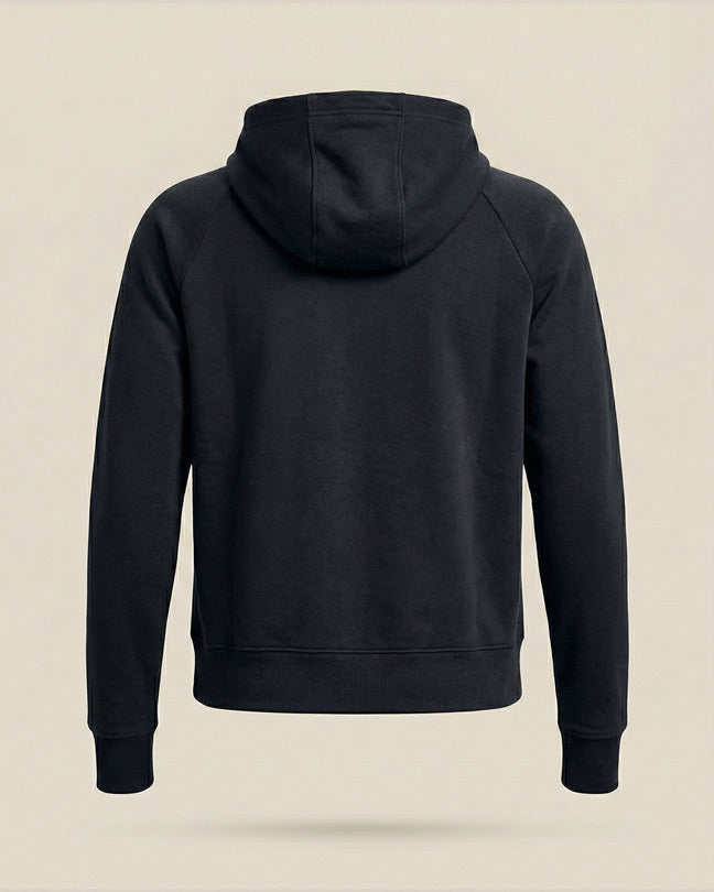 Back view of plain black hooded sweatshirt with long sleeves on beige background