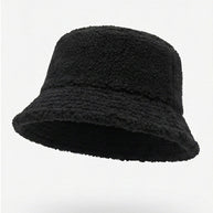 Black fleece bucket hat with textured fabric on a white background