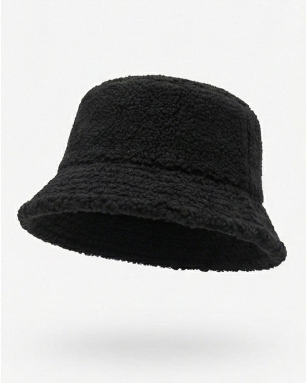 Black fleece bucket hat with textured fabric on a white background